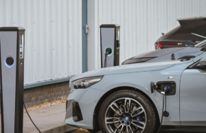 An electric car charging outside 